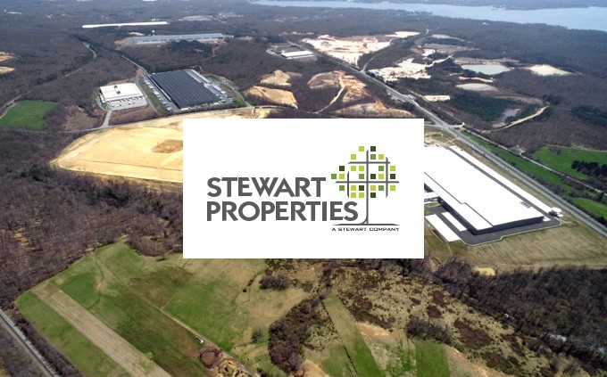 Stewart Properties logo and business center